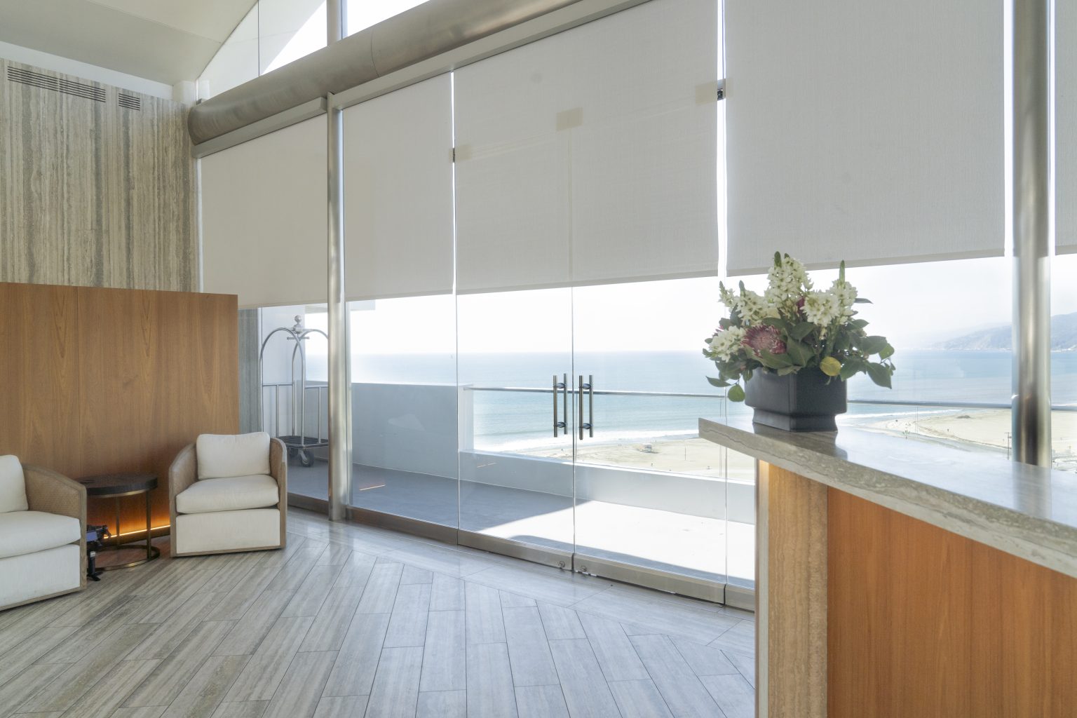 custom Luxury interior white roller shades california condo building santa monica